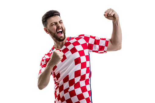 Atleta Masculino croata / ventilador celebrando sobre fondo blanco photo