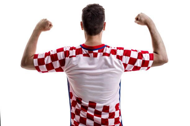 istock Croatian male athlete / fan celebrating on white background 908108706