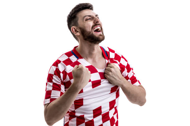 istock Croatian male athlete / fan celebrating on white background 908110940