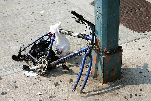 Blue bicycle laying on the ground.
