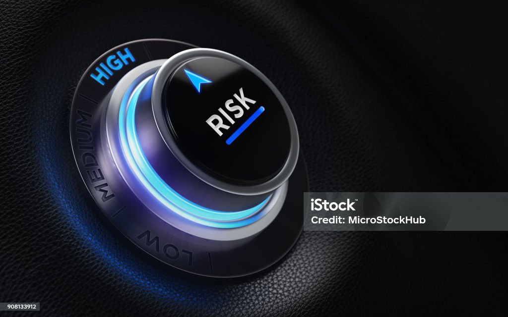 Finance And Investment Concept - Risk Labeled Button On A Car Dashboard Finance and investment concept. Risk labeled button on car dashboard. There is risk text on the button and it is pointing high possibility. Horizontal composition with copy space and selective focus. Risk Stock Photo