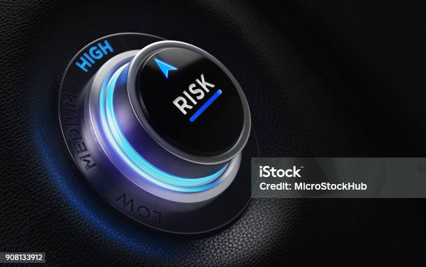 Finance And Investment Concept Risk Labeled Button On A Car Dashboard Stock Photo - Download Image Now