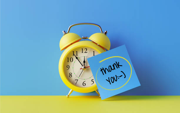 istock Alarm Clock And A Blue Post It Not Over Blue Background 908134182