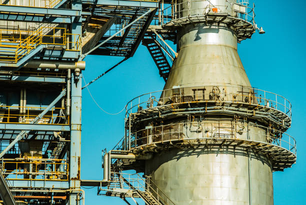 istock Geometric factory shaping shines at dusk. 908141394