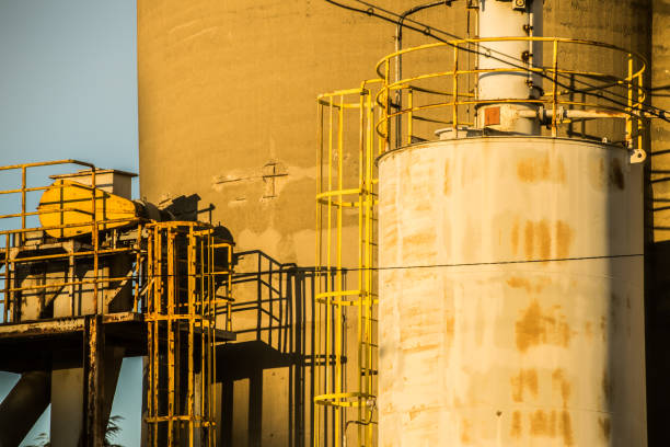istock Geometric factory shaping shines at dusk. 908141450