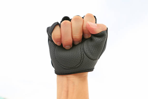 istock Sporting gloves isolated on white background. Wearing mitten. Glove Punch. 908151256