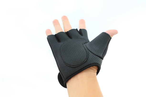 istock Hand wearing sport glove asking or offering help isolated on white background. Giving a helping hand. 908151544