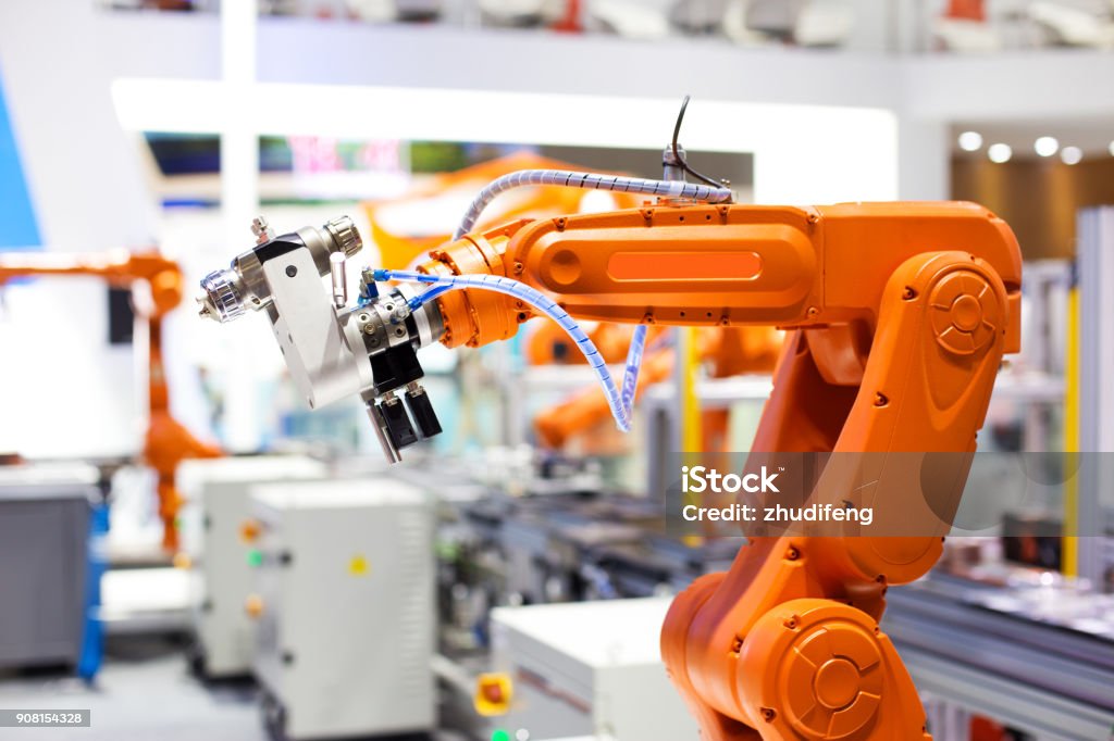 artificial intelligence machine artificial intelligence machine in modern factory Robotic Arm Stock Photo