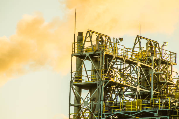 istock Blue sky and smoke in industrial areas 908154464