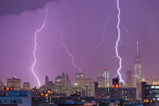 Night time view of Downtown Manhattan during a severe lightning storm.