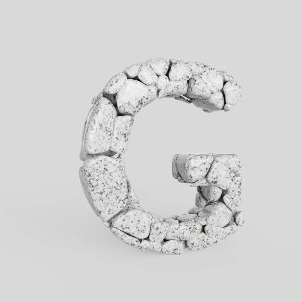 istock Upper Case Letter G Made of Smooth Stones on a White Background 908161668