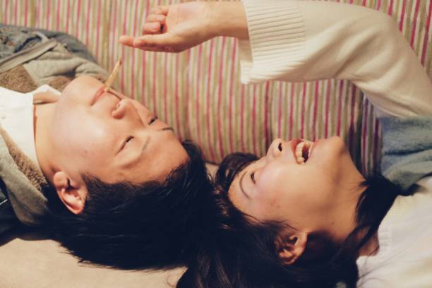 Young couple lying on the sofa