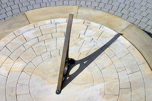 Sundial Sundial throwing a shadow ancient sundial stock pictures, royalty-free photos & images