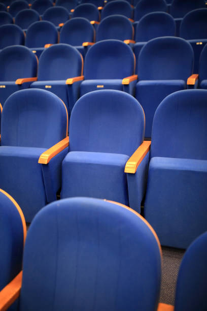 istock Blue armchairs in theater 908180008
