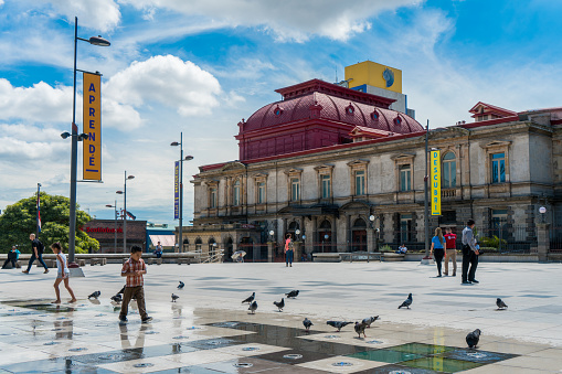 SAN JOSE, COSTA RICA - November 12: Afternoon scene of the square in front of the famous National Theater of Costa Rica in San Jose Nov 12, 2017.
