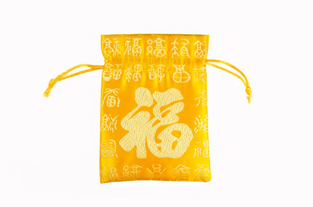 istock Golden blessing packet isolated on white background.English translation for foreign text means blessing. 908185480