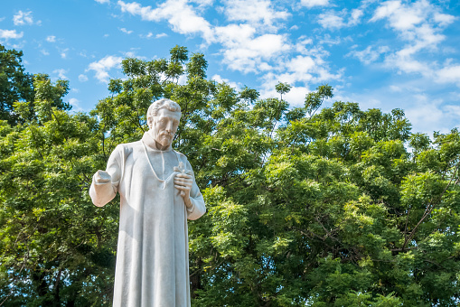 Malacca,Malaysia - July 16, 2017 : Statue of St. Francis Xavier in front of the ruins of St Paul's Church.Malacca.