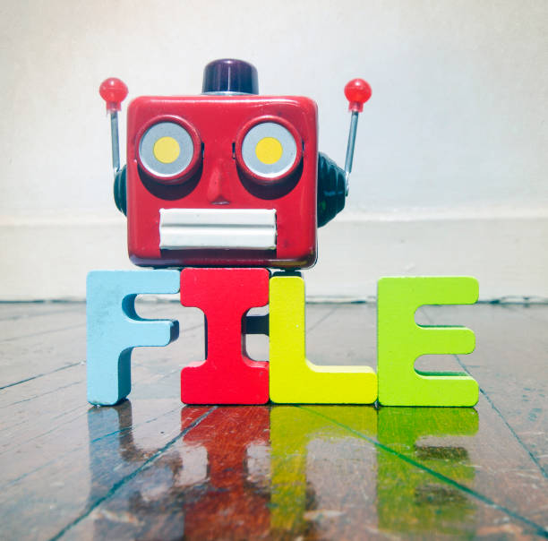istock red retro robot head on the word FILE 908196162