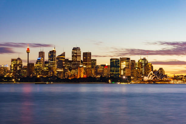 istock Sydney cityscape at sunset 908207388