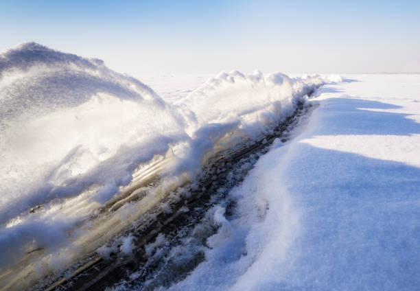 istock Ice wall.First rays of the sun.After the storm. 908207786