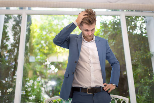 istock bearded business man with body language. 908209292