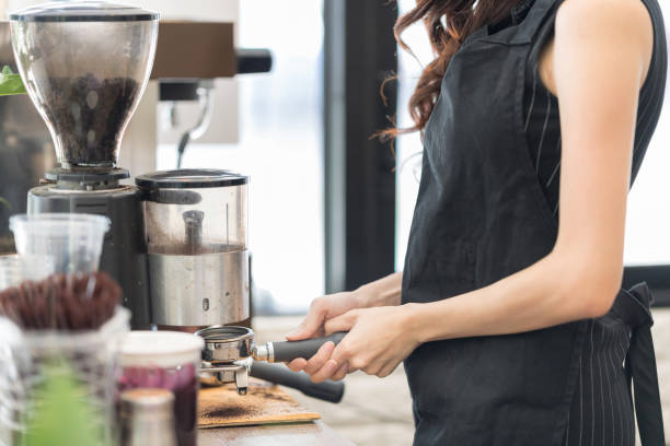 istock attractive young beautiful caucasian barista 908209352