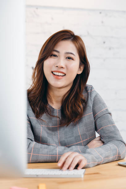 istock Asian young businesswoman in her office. 908209996