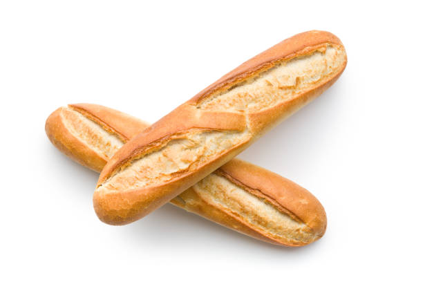 french baguettes french baguettes on white background baguette stock pictures, royalty-free photos & images