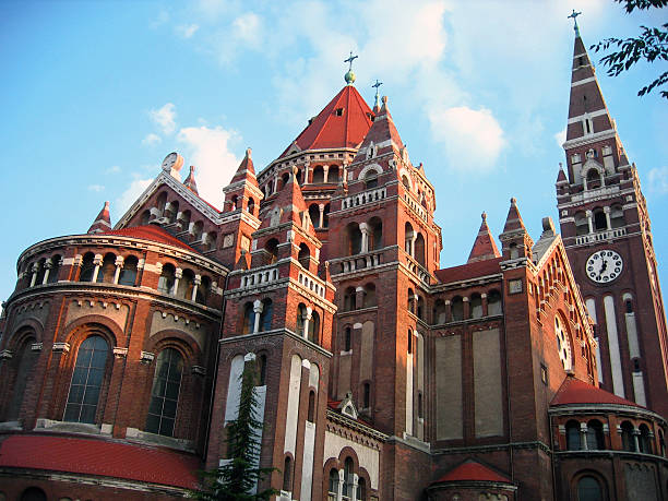 Buildings Around Mary Catholic Church Clocktower In Novi Sad, Serbia