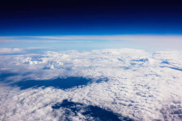 istock View from the airplane of a fluffy calm clouds and bewitching sky background with copy space for your text message or promotional content, advertising field 908213974