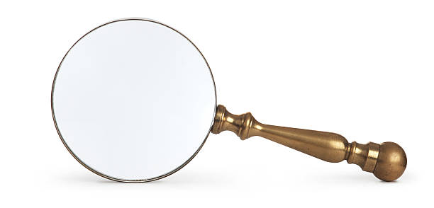 istock antique magnifying glass on white background 90821739