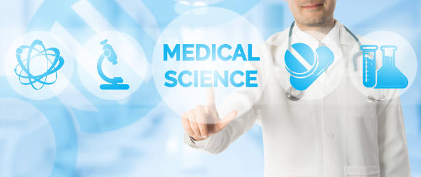 istock Doctor Points at MEDICAL SCIENCE with Medical Icon 908223416