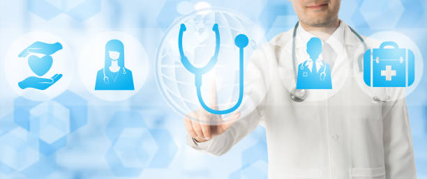 istock Doctor points at stethoscope with medical icons. 908223432
