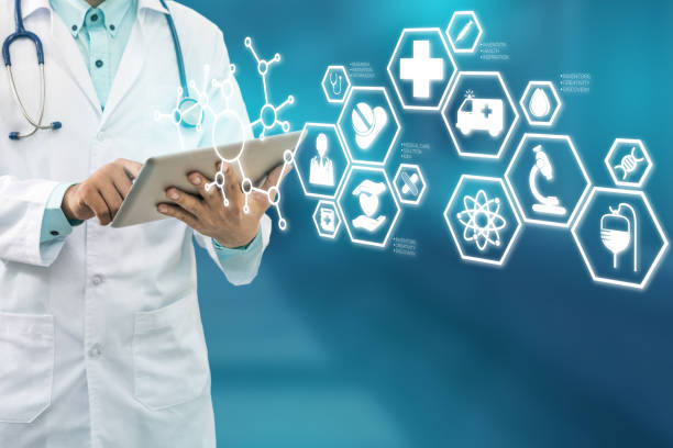 istock Doctor with Medical Healthcare Icon Interface 908223444