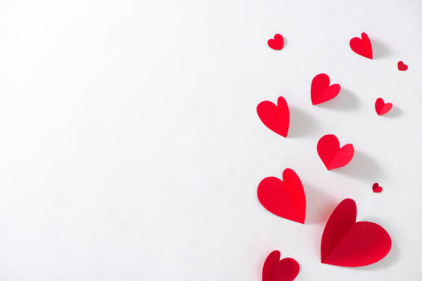 istock Valentine card with red heart and ribbon 908223744