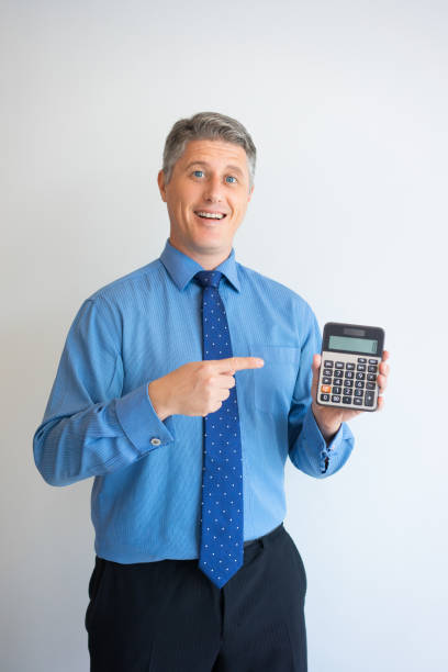 istock Happy businessman showing calculator 908223868