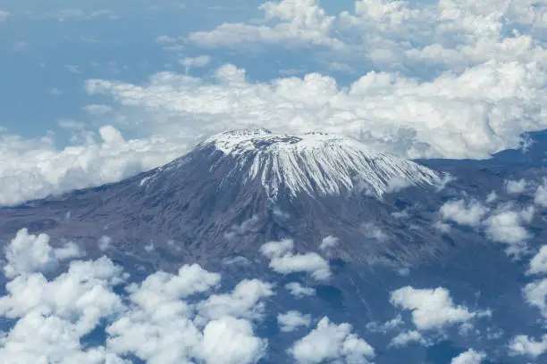An aerial view of Mount Kilimanjaro, taken from the flight deck of an airplane