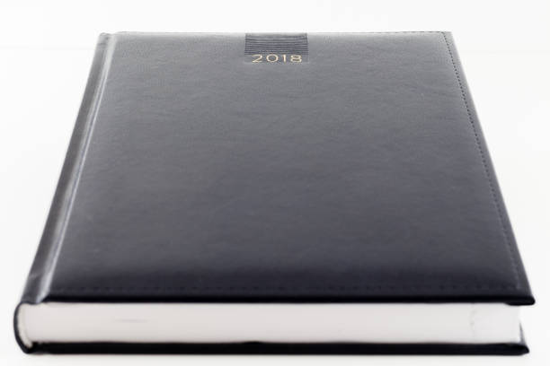 istock 2018 Black Agenda Organizer diary day week month Calendar planner isolated on white background 908227474