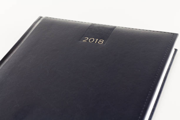 istock 2018 Black Agenda Organizer diary day week month Calendar planner isolated on white background 908227544