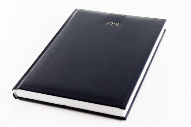 istock 2018 Black Agenda Organizer diary day week month Calendar planner isolated on white background 908227668