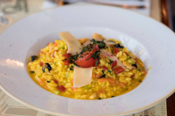 istock Risotto with safran and vegetables 908227730