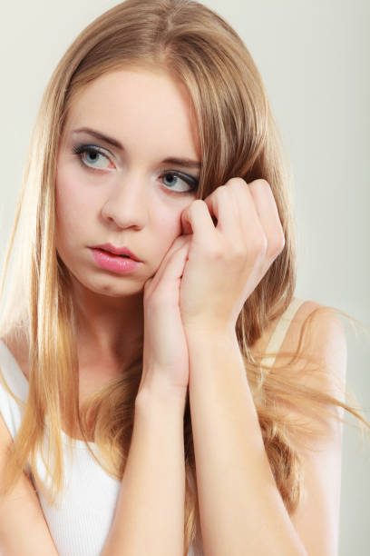 istock Young sad stressed woman closeup 908231688