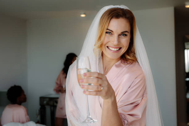 istock Bride celebrating hen party with friends at home 908235956