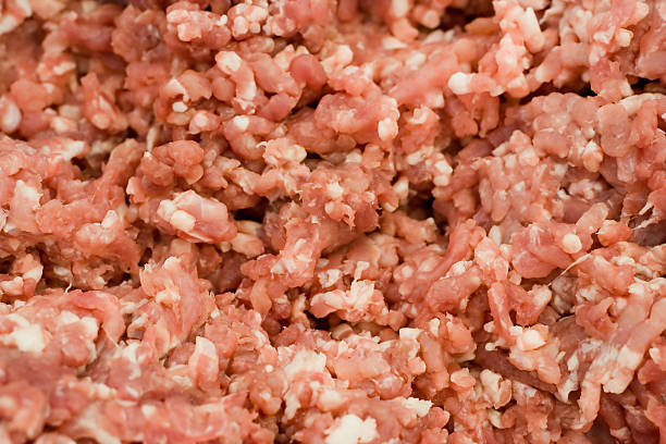 Stuffing meat stock photo