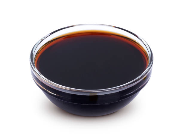 Soy sauce isolated on white background Soy sauce in bowl isolated on white background with clipping path. Top view soy sauce photos stock pictures, royalty-free photos & images