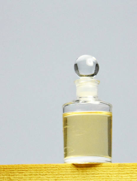 istock Retro styled small bottle with liquid, can be tonic, perfume, lotion or something else 908256426