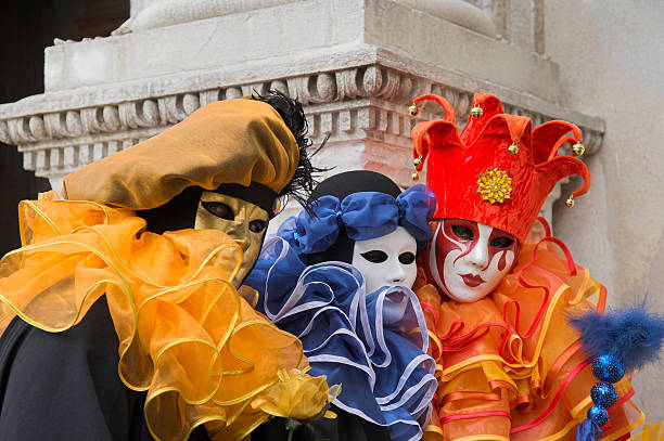istock Three masks with colorful costumes at carnival in Venice (XXL) 90825655