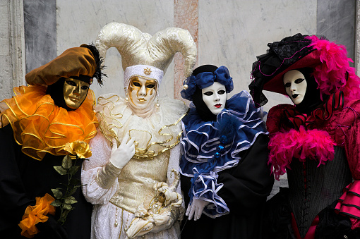 Lucerne, Switzerland - February 20, 2023: Scene of streets with participant and others, some in costumes, during the Fasnacht Carnival, in Lucerne (Luzern), Switzerland