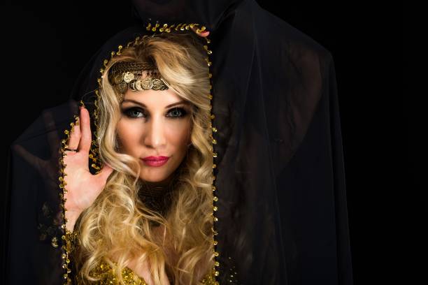 istock Woman fortune teller portrait at black 908258822