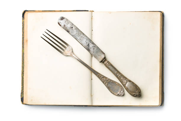 istock vintage book and cutlery 908263090